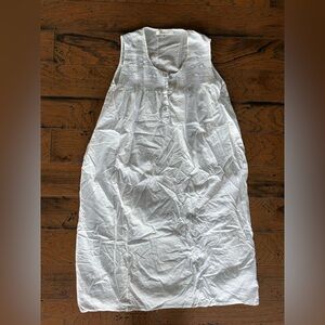 Cotton nightgown or dress.  White with smocking and floral details at chest